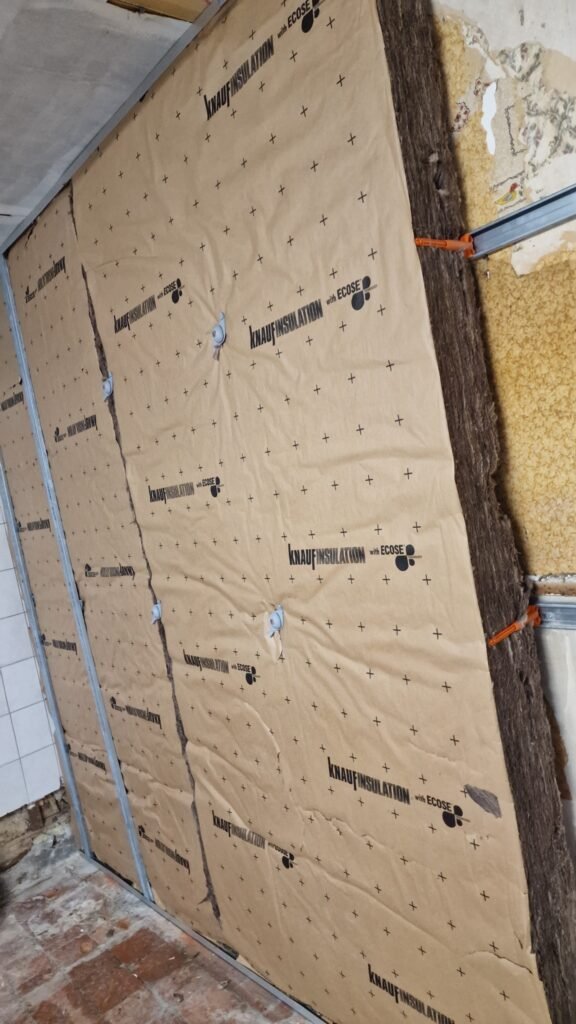 mur après dépose dans une rénovation intérieure avant pose du placo à Rethel